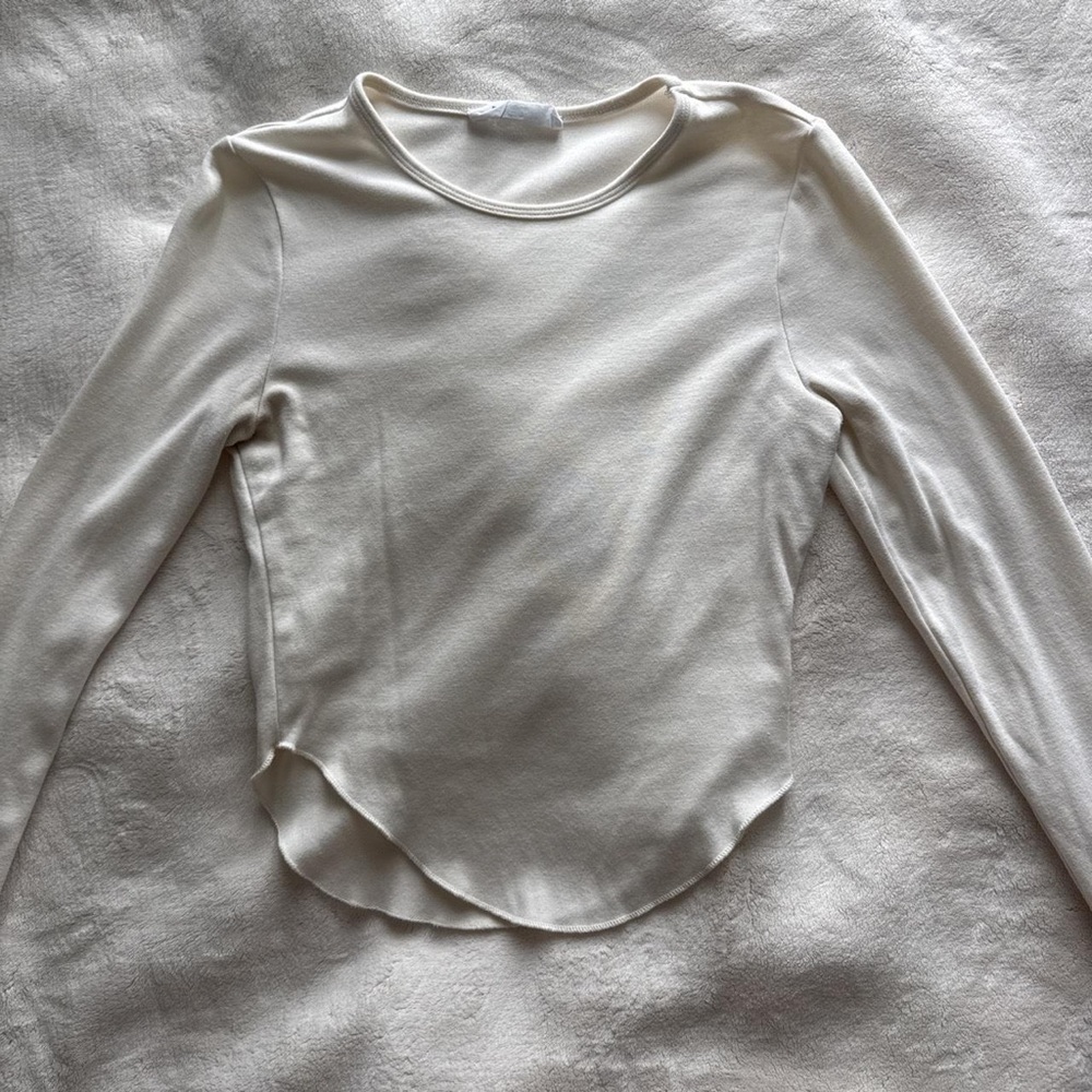 Light Cream Long-Sleeve Scoop Hem Top